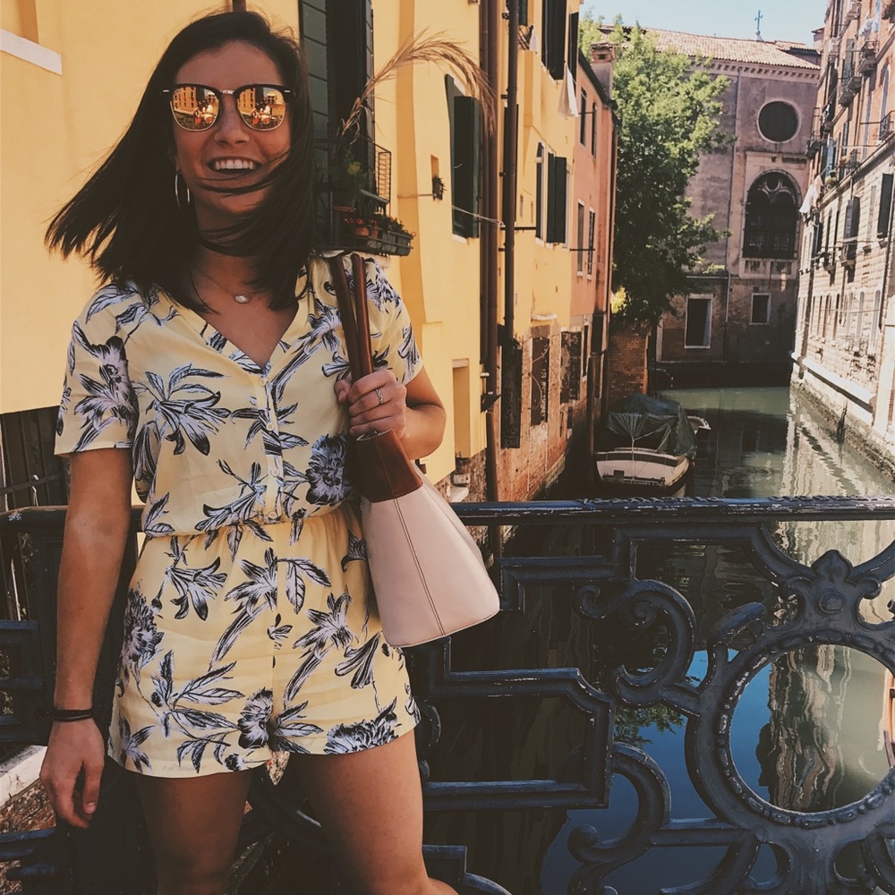 Yellow button up romper